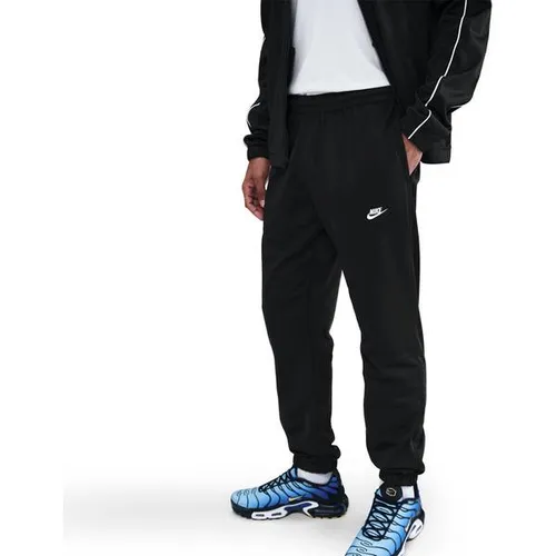 NIKE Herren Sportanzug Sportswear Club - Bequemer Trainingsanzug aus leichtem Poly-Strickmaterial. Ideal für entspannte Freizeitaktivitäten und sportliche Einsätze. Mit klassischem Design und Standardpassform für hohen Tragekomfort.