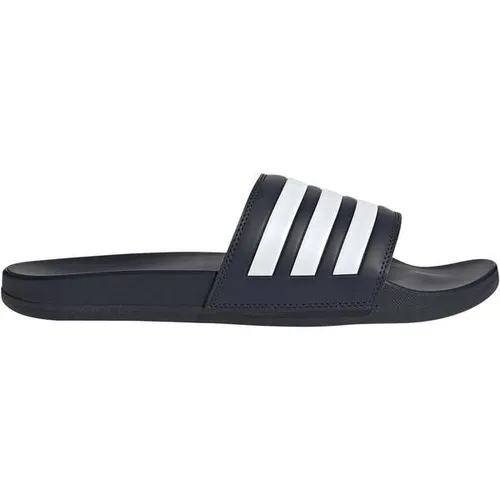 adidas Unisex Adilette Comfort Slides, 47 EU - Bequeme Slipper für jeden Tag - Wanderschuhe mit regulärer Passform, leichtem Slip-On-Design und angenehmer Dämpfung für optimalen Komfort unterwegs.