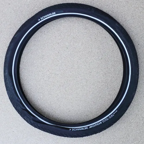 Schwalbe Motion Big Apple 20'' x 2.00 - Komfortabler Urbanreifen - Fahrradreifen mit RaceGuard Pannenschutz und umweltfreundlicher Addix Green Gummimischung für E-Bikes bis 25 km/h. Genießen Sie höchsten Komfort und Dämpfung auf jedem Untergrund.