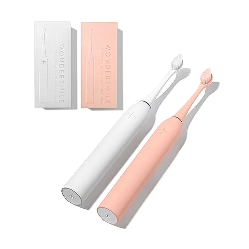 Wondersmile Schallzahnbürste Couple Bundles - Testsieger - Elektrische Zahnbürsten für gesündere Zähne! 100 Tage risikofrei testen, inkl. 2 Aufsteckbürsten und integriertem Zungenreiniger.