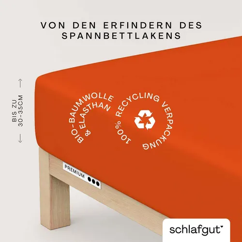 Schlafgut Spannbetttuch Premium aus Bio Baumwolle 180x200 - 200x220 cm | red-mid - rot - Bettlaken aus 100% Bio Baumwolle mit 5% Elasthan für perfekten Sitz, pflegeleicht und trocknergeeignet. Umweltfreundliche Zero-Waste Verpackung und Made in Green zertifiziert.