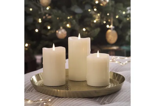 Lights4fun TruGlow® LED-Kerzen Trio mit Fernbedienung - Echtwachskerzen im praktischen Trio, batteriebetrieben und mit Fernbedienung für eine stimmungsvolle Beleuchtung ohne Flamme.