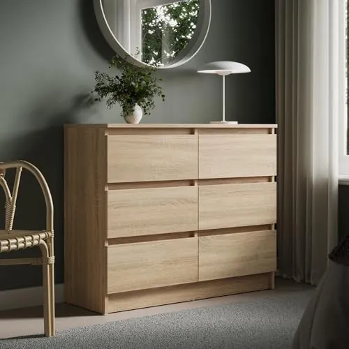 Kommode mit 6 Schubladen - Sonoma Holz Design für jeden Raum - Diese stilvolle Kommode bietet mit ihren sechs geräumigen Schubladen viel Stauraum und passt perfekt in Schlafzimmer, Flur oder Wohnzimmer. Ihr modernes, griffloses Design sorgt für einen minimalistischen Look. Hergestellt in einem deutschen Meisterbetrieb.