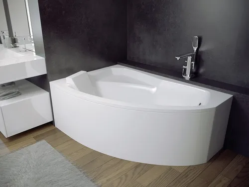 KOLMAN Eckbadewanne Rima 170x110 - Komfort und Stil für Ihr Bad - Genießen Sie mit der KOLMAN Eckbadewanne Rima ein luxuriöses Badeerlebnis. Hergestellt aus hochwertigem, pflegeleichtem Acryl, bietet sie ein modernes Design und hervorragende Wärmeisolierung.