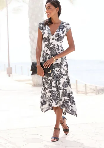 Sommerkleid mit Zipfelsaum und Schleife von Lascana - Elegantes Strandkleid in Schwarz-Weiß mit Paisley-Muster, ideal für warme Tage. Der schwingende Rock und der überlappende V-Ausschnitt sorgen für einen femininen Look.
