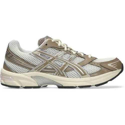 ASICS GEL-1130 Sneaker – Retro-Laufschuh - Stylischer Retro-Laufschuh mit GEL-Dämpfung für hohen Komfort. Das atmungsaktive Mesh-Obermaterial sorgt für ein angenehmes Tragegefühl. Ideal für den täglichen Einsatz und modische Akzente.