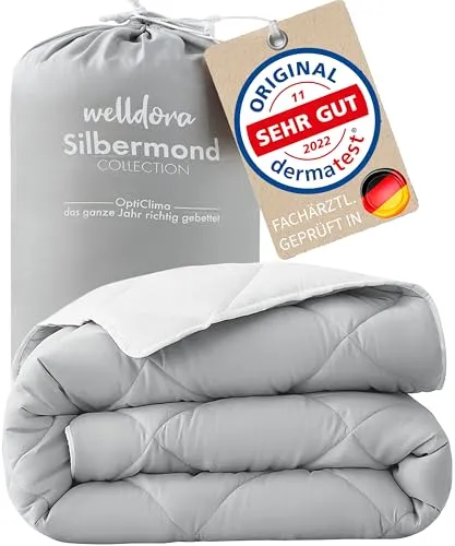 Welldora OPTICLIMA Allergiker Bettdecke 135x200 – Wendedecke für ganzjährigen Komfort - Genießen Sie erholsamen Schlaf mit der OPTICLIMA Bettdecke 135x200 cm. Die innovative Füllung sorgt für optimale Klimakontrolle, während die waschbare Mikrofaser höchsten Komfort bietet. Ideal für Allergiker und einfach zu pflegen.