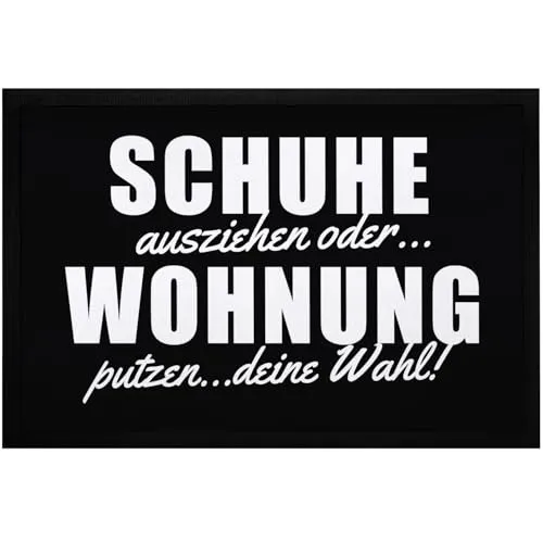 MoonWorks Fußmatte mit Spruch - Schuhe ausziehen oder Wohnung putzen, rechteckig schwarz - Stilvolle Fußmatte aus einem robusten Materialmix, rechteckig und rutschsicher. Ideal für jeden Eingangsbereich und sorgt für einen einladenden Look.