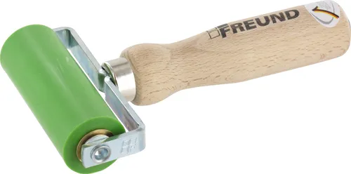 Freund Silikon-Andrückrolle 90mm - Präzise und Komfortabel - Verarbeitungswerkzeuge: Ergonomische Fingermulde für optimales Handling und kraftschonende Anwendung, ideal für präzise Arbeiten.