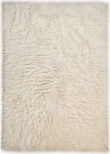 THEKO Wollteppich Flokos 1 - Hochflor Teppich für Gemütlichkeit - Hochflor-Teppiche, handgewebt aus reiner Schafschurwolle, bieten mit ihrer üppigen Höhe von 40 mm und stilvollen Uni-Farben ultimativen Komfort und dämpfen Trittgeräusche.