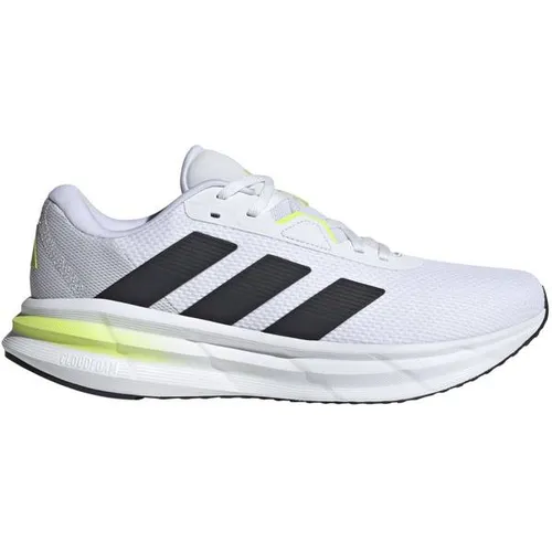adidas Herren Galaxy 7 Laufschuhe - FTWR White/Core Black/Solar Slime, Größe 44 2/3 EU - Leichte Herren-Laufschuhe mit regulärer Passform und Cloudfoam-Dämpfung für optimalen Komfort beim Laufen. Ideal für Training und Freizeit.