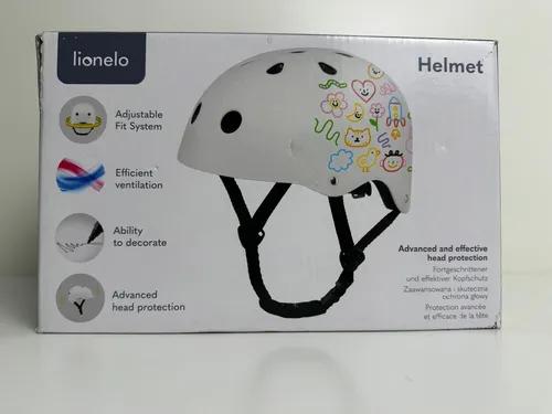 LIONELO Schutzhelm für Kinder - Verstellbar 50-56 cm, Beige - Fahrradhelm mit Kinnschutz und individuellem Design. Ideal für Sicherheit und Kreativität, da er mit Kreide bemalt werden kann. Ergonomisch und belüftet für optimalen Komfort.