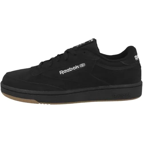 Reebok Club C 85 Unisex, Cblack Ftwwht Rbkle3, 35 EU - Hochwertige Unisex-Schuhe aus strapazierfähigem Glattleder, ideal für den Alltag. Die dämpfende Schaumstoff-Zwischensohle sorgt für hohen Tragekomfort und die robuste Gummi-Außensohle bietet optimale Traktion.