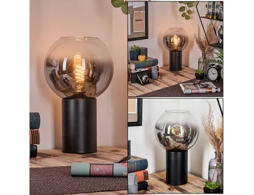 Hofstein Tischleuchte im Retro-Design aus Metall und Glas - Elegante Tischlampe in Schwarz und Rauchfarben, ideal für jeden Innenraum. Mit ihrem vintage Charme und dem klaren Glasschirm setzt sie stilvolle Akzente in Ihrem Arbeitszimmer oder Wohnzimmer.