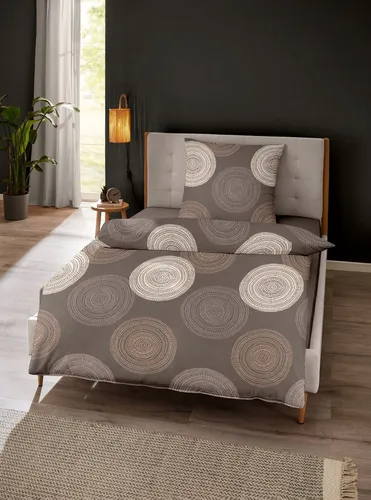 Dormisette Edel Biber Bettwäsche 155x220 Kreise Punkte braun beige - Hochwertige 2-teilige Bettwäsche aus 100% Baumwolle in 155x220 cm und 80x80 cm, ideal für kalte Nächte. Das kuschelige Feinbibergewebe sorgt für optimalen Komfort und einfache Pflege durch waschbar bis 60 °C.