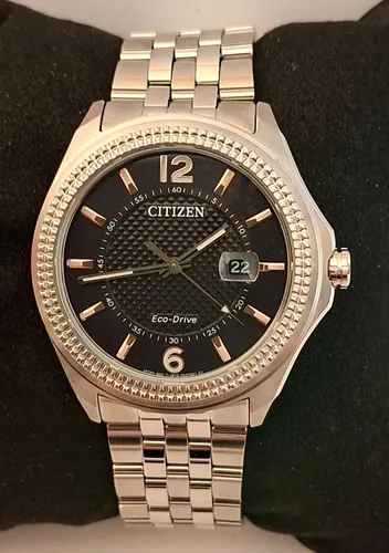 Citizen Dress Watch AW1740-54H - Elegante Armbanduhr für Herren mit präzisem Quarzwerk und stilvollem Design, ideal für besondere Anlässe oder den Alltag.