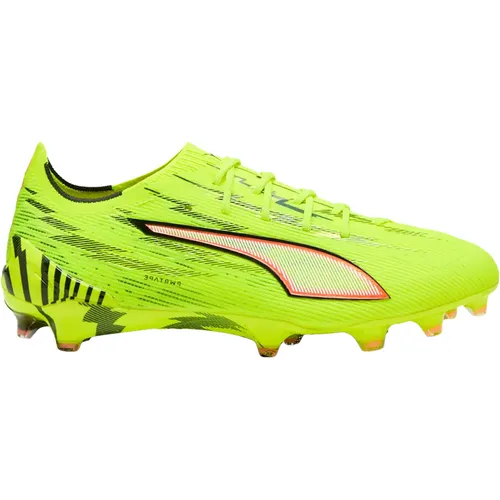 Puma ULTRA 6 ULTIMATE FG - Fußballschuh in Gelb - Erlebe maximale Beschleunigung mit dem Puma ULTRA 6. Der innovative Schuh bietet ein reaktionsschnelles Tragegefühl und optimale Traktion. Ideal für schnelle Bewegungen auf festen Plätzen.