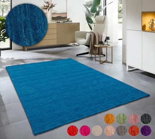 THEKO Wollteppich Holi - Handgewebter Teppich in Blau (90x160 cm) - Teppich aus 100% reiner Schurwolle, strapazierfähig und fußbodenheizungsgeeignet. Ideal für eine warme und gemütliche Wohnatmosphäre.