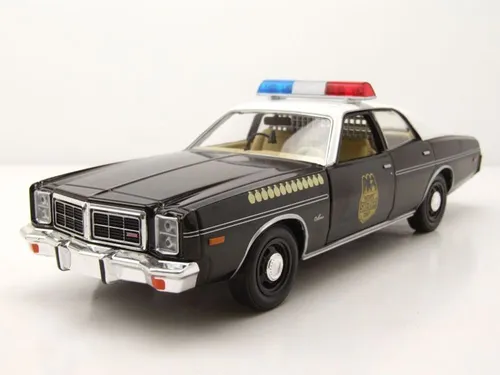 Dodge Monaco 1977 Polizei Modellauto 1:24 - Hochwertiges Standmodell des Dodge Monaco 1977 in Schwarz und Weiß, mit öffnenden Türen. Ideal für Sammler und Fans von Polizeiautos.