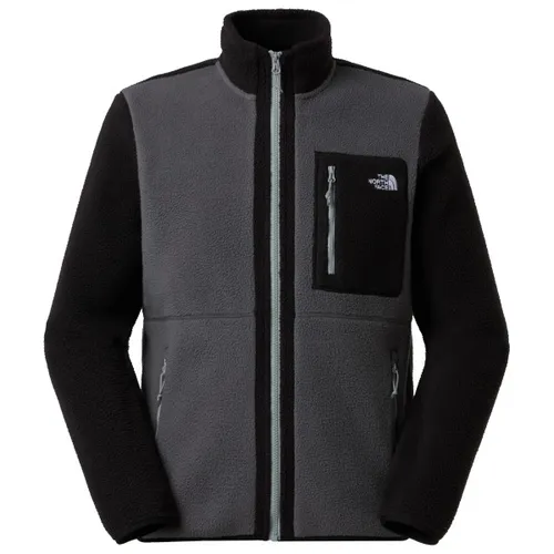 The North Face Yumiori Fleecejacke für Herren - anthrazitgrau - Die Yumiori Fleecejacke von The North Face kombiniert komfortable Wärme mit umweltfreundlichem Design. Ideal für Outdoor-Aktivitäten, besteht sie aus 100% recyceltem Polyester und bietet praktische Details wie Handwärmtaschen und einen sicheren Reißverschluss.