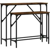 vidaXL Konsolentische 2 Stk. Räuchereiche Holzwerkstoff - Elegante Konsolentische aus langlebigem Holzwerkstoff, ideal für Flur oder Wohnzimmer. Mit verstellbaren Beinen für Stabilität und einem robusten Metallrahmen für industrielle Akzente.