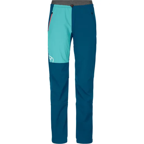 Ortovox Berrino Pants Women petrol blue (S) - Bequeme Skitourenhose - Wanderhosen für Skitouren mit Merino Airsolation-Material, das Komfort und Performance vereint. Leicht, athletisch geschnitten und PFC-frei, ideal für Outdoor-Abenteuer!