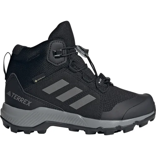 adidas Terrex Mid Gore-tex Wanderschuhe für Kinder - Wanderschuhe mit GORE-TEX Membran für trockene Füße, ideal für Abenteuer und Alltag. Leicht, mit Speed-Lacing System und aus mindestens 20 % recycelten Materialien.