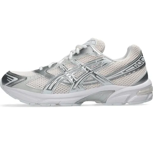 Asics Unisex GEL-1130 Turnschuhe grau (37) – Sportlich und Lässig - Stilvolle Turnschuhe mit GEL-Technologie für optimalen Komfort. Atmungsaktive Materialien und ein modernes Design machen sie perfekt für urbane Aktivitäten und Multisport-Einsätze.