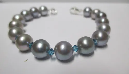 Edelschmiede925 Süßwasser Perlen Armband - Elegantes Armband aus 925/- Sterlingsilber mit geknoteten Süßwasserperlen, ideal als Geschenk für besondere Anlässe oder als stilvolles Accessoire für den Alltag.