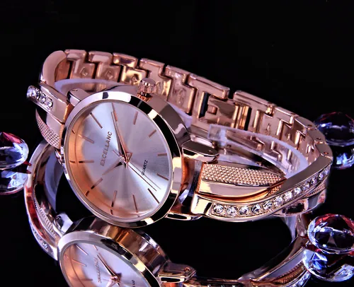 Excellanc Damen Armband Uhr Rose Gold mit Strass - Elegante Armbanduhr für Damen im modischen Rosegold, verziert mit Strasssteinen und einem 12-Stunden-Zifferblatt, perfekt für jeden Anlass.
