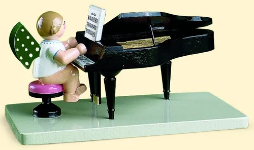 Wendt & Kühn Engel am offenen Flügel - 7cm - Nussknacker Dekofigur, handgefertigt und detailreich, ideal für eine festliche Atmosphäre in Ihrem Zuhause.