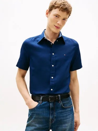 Tommy Hilfiger Herren Cl Linen Blend Solid Ss Rf Sht Mw0mw42450 S/S Shirt, Carbon Navy, M - Hochwertiges Tommy Hilfiger Shirt aus einem leichten Leinen-Mix, ideal für warme Tage und lässige Anlässe. Stilvoll und bequem, perfekt für den Sommer! Die nachhaltige Produktion sorgt für ein gutes Gewissen beim Tragen.