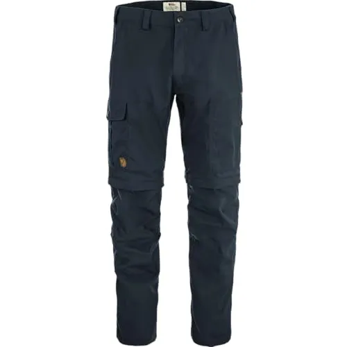 Fjällräven Karl Pro Zip-off Trousers M - Dunkelblau (555) 56 - Vielseitige Herren-Trekkinghose mit Zip-Off-Funktion, ideal für Reisen und Outdoor-Abenteuer. Strapazierfähiges G-1000 Silent Material, wasserabweisend und windfest, mit acht praktischen Taschen für alle wichtigen Utensilien.
