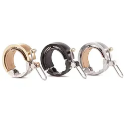 Knog 12131 OI Luxe Fahrradklingel - Messing, L - Fahrradklingel mit unverwechselbarem Klang und flachem Profil, passend für Lenkerdurchmesser 23-31 mm. Ideal für stilbewusste Radfahrer.