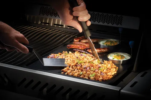 Napoleon Frühstücksset 6-teilig - Grillzubehör mit 4 Universalringen und 2 Planchaspateln, ideal für perfekte Spiegeleier und Burger. Silikongriffe für optimale Handhabung.