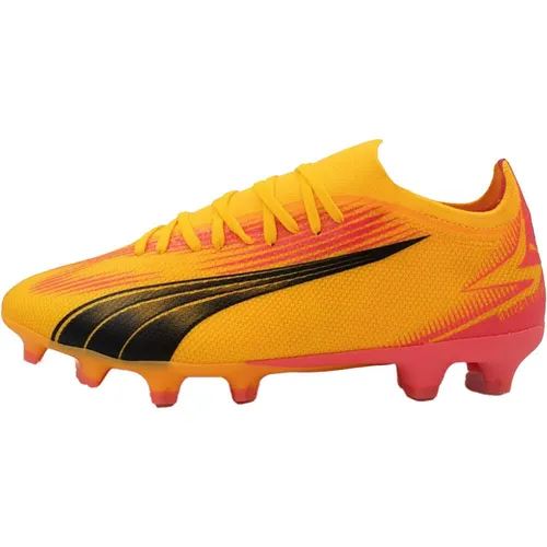 PUMA ULTRA MATCH FG/AG Fußballschuhe Herren - Orange/Rosa - Fußballschuhe für Herren mit leichtem Mesh-Obermaterial und GripControl für optimale Ballkontrolle. Ideal für feste Böden und Kunstrasen, hergestellt aus 20% recycelten Materialien für mehr Nachhaltigkeit.