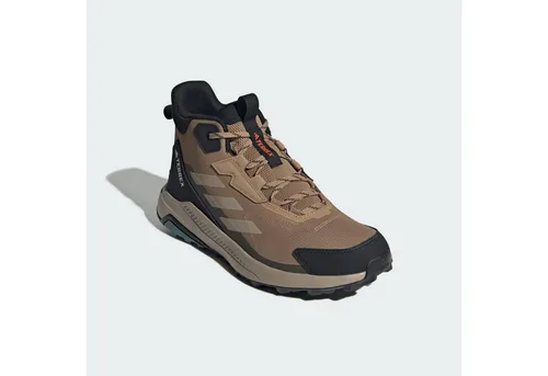 adidas TERREX ANYLANDER MID Wanderschuh beige 42 EU - Sportlicher Wanderschuh mit TRAXION™-Technologie für optimalen Halt auf unebenem Gelände. Fällt klein aus, bitte eine Größe größer bestellen. Ideal für Outdoor-Abenteuer.