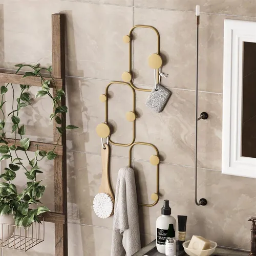 Dekorativer Metall-Wandhaken in Gold - Bilder & Drucke, stilvoller Wandhaken für jeden Raum, bringt Eleganz und Ordnung in Ihr Zuhause.