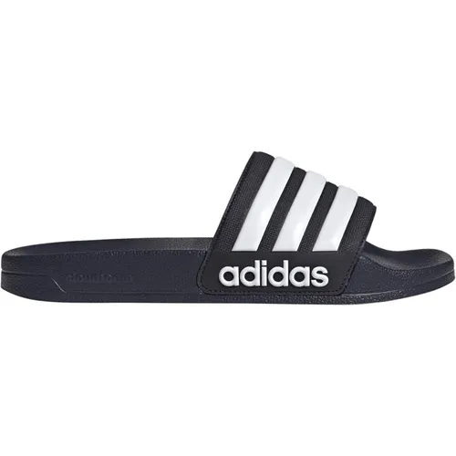 adidas Adilette Shower Sandalen - Dunkel Blau - Größe 11 - Badeschuhe in Dunkel Blau, ideal für den Einsatz nach dem Schwimmen, mit rutschfester Sohle für optimalen Halt und Komfort.