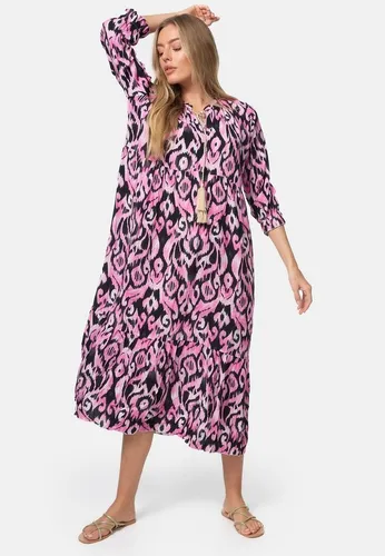 Rayshyne Maxikleid PM-37 – Sommerkleid mit auffälligem Print - Entdecken Sie das RAYSHYNE Damen Maxikleid PM-37 in Einheitsgröße. Mit seinem einzigartigen, geometrischen Print und leichtem Material ist es ideal für warme Tage und sorgt für einen trendigen Auftritt bei jedem Anlass.