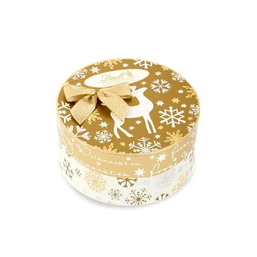 Lindt Goldstücke Pralinés Rundschachtel 140g - Entdecken Sie die köstlichen Goldstücke Pralinés in festlichen Sorten wie Bratapfel, Walnuss, Zimt & Koriander. Perfekt als Geschenk für die Vorweihnachtszeit, verpackt in einer eleganten Schachtel.