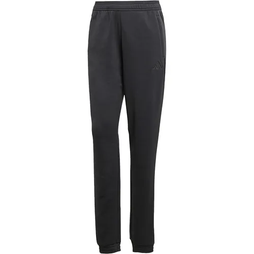 adidas Performance Tiro 25 Trainingshose für Damen - Hochwertige Sweatpant mit adidas AEROREADY-Technologie, ideal für Vereine oder persönliche Sportausrüstung. Elastische Bündchen und seitliche Reißverschlusstaschen bieten zusätzlichen Komfort.