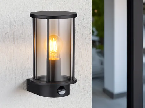LED Außenwandleuchte Edelstahl Schwarz mit Bewegungsmelder, 25cm - Moderne Außenleuchte aus robustem Edelstahl mit rauchfarbigem Glas, integrierter Bewegungsmelder für Sicherheit und Komfort, ideal für den Außenbereich.