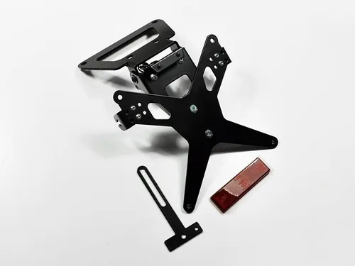 ZIEGER Kennzeichenhalter X-Line für Suzuki GSX-R 1000 BJ 2003-04 - Hochwertiger ZIEGER X-Line Kennzeichenhalter für Suzuki GSX-R 1000 BJ 2003-04. Robuste Witterungsbeständigkeit, verstellbarer Neigungswinkel und einfache Montage – ideal für eine sportliche Optik ohne TÜV-Eintragung.