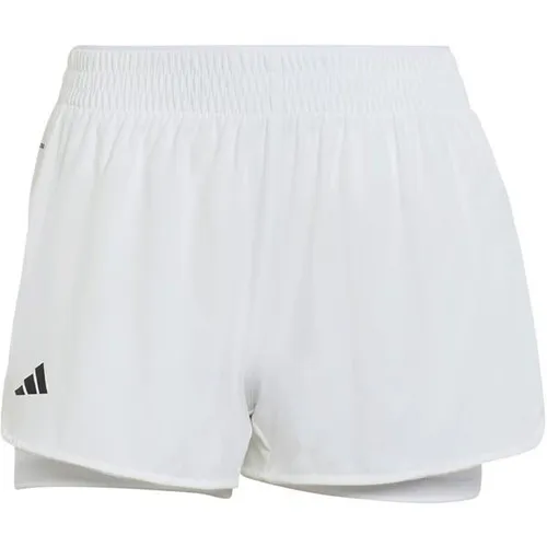 ADIDAS Damen Shorts TENNIS CLIMACOOL 2IN1 MATCH - Die ADIDAS Tennis Climacool 2-in-1 Match Shorts bieten optimalen Komfort und Bewegungsfreiheit. Mit atmungsaktiven Materialien und elastischem Bund sind sie ideal für sportliche Aktivitäten und sorgen für ein frisches Tragegefühl.