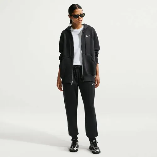 Nike Damen NSW Phnx FLC Mr Pant Std Hose - Modische Hose in Black/Sail, bietet hohen Tragekomfort und ein innovatives Design mit elastischem Bund für optimale Passform.