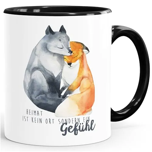 Kaffee-Tasse Heimat ist kein Ort sondern ein Gefühl Fuchs Liebe Spruch Geschenk MoonWorks® schwarz unisize