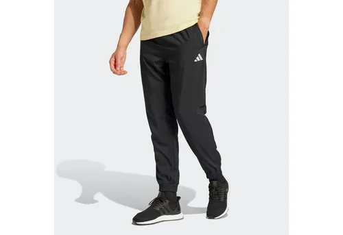adidas M STANFRD E Trainingshose Herren - Größe XXXL in Schwarz - Bequeme Trainingshose aus leichtem, recyceltem Polyester mit elastischem Bund und Mesh-Futter; ideal für sportliche Aktivitäten und Freizeit.