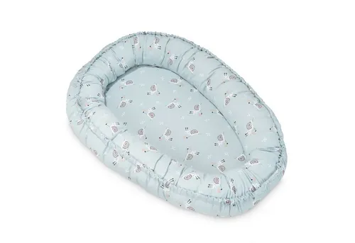 Julius Zöllner Schnecke Kuschelnest NIDO Jersey - Gitterbetten - Sicheres Kuschelnest für Neugeborene, gefüllt mit Hohlfaserflocken für optimalen Komfort und Geborgenheit.