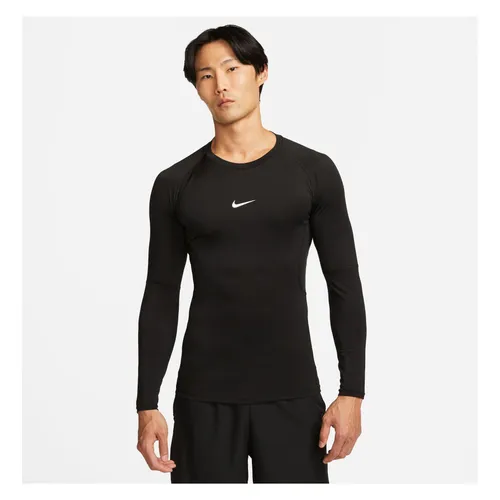 Nike Herren NP DF Tight LS T-Shirt - Schwarz/Weiß, Größe L - Sweatshirts mit Nike Dri-FIT-Technologie für optimale Feuchtigkeitsregulierung und dehnbarem Strickstoff für höchsten Tragekomfort und Bewegungsfreiheit.